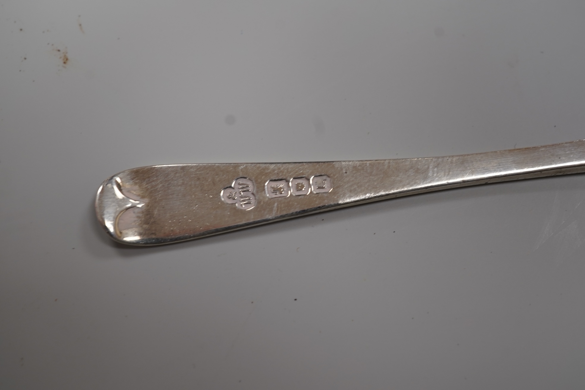 A George V silver drum mustard by Mappin & Webb, Birmingham, 1923, height 71mm, with associated spoon, together with a pair of George V silver pepperettes, Adie Brothers, Birmingham, 1923.